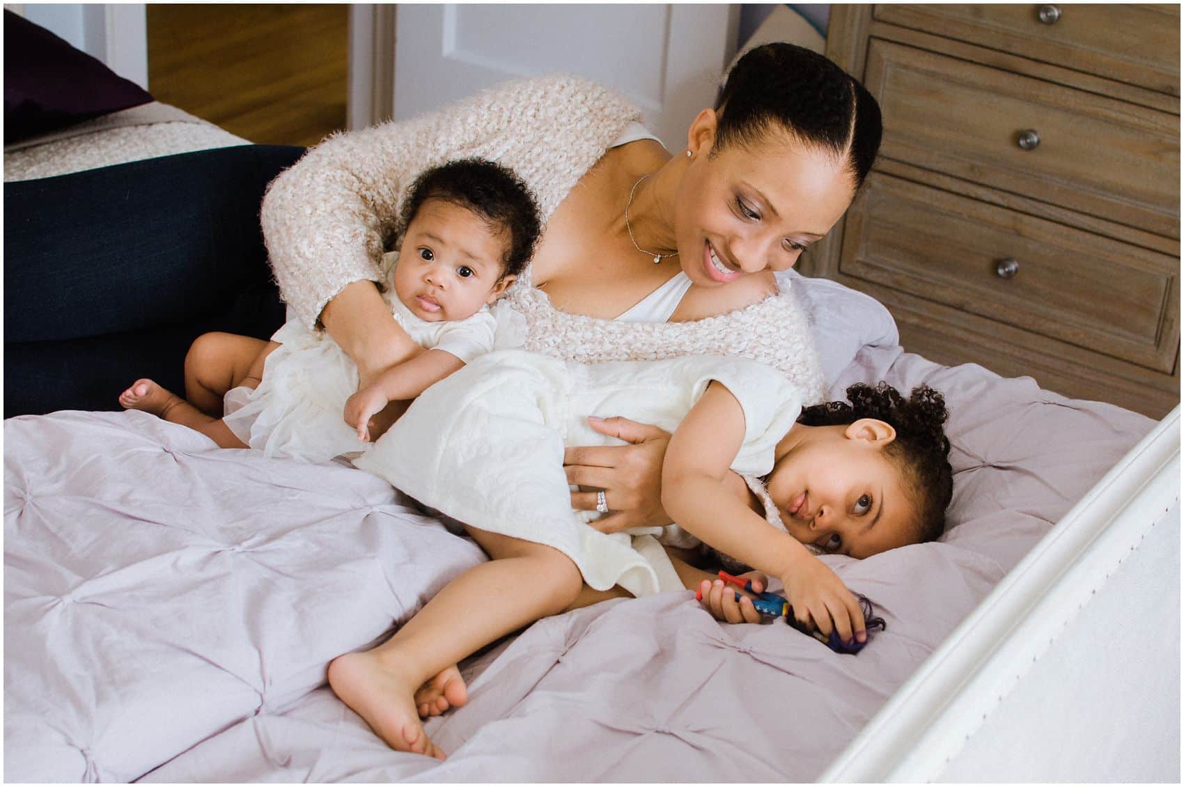 mama and her girls during our newborn session in New York home
