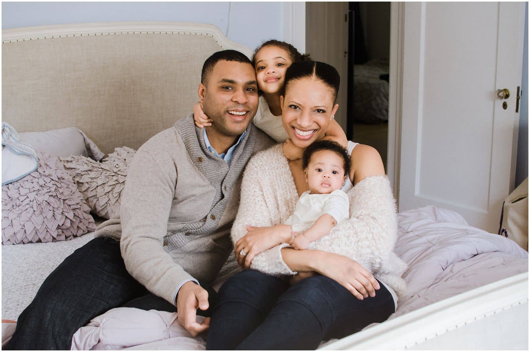 family pictures at home with the newborn girl at home in New York, NY