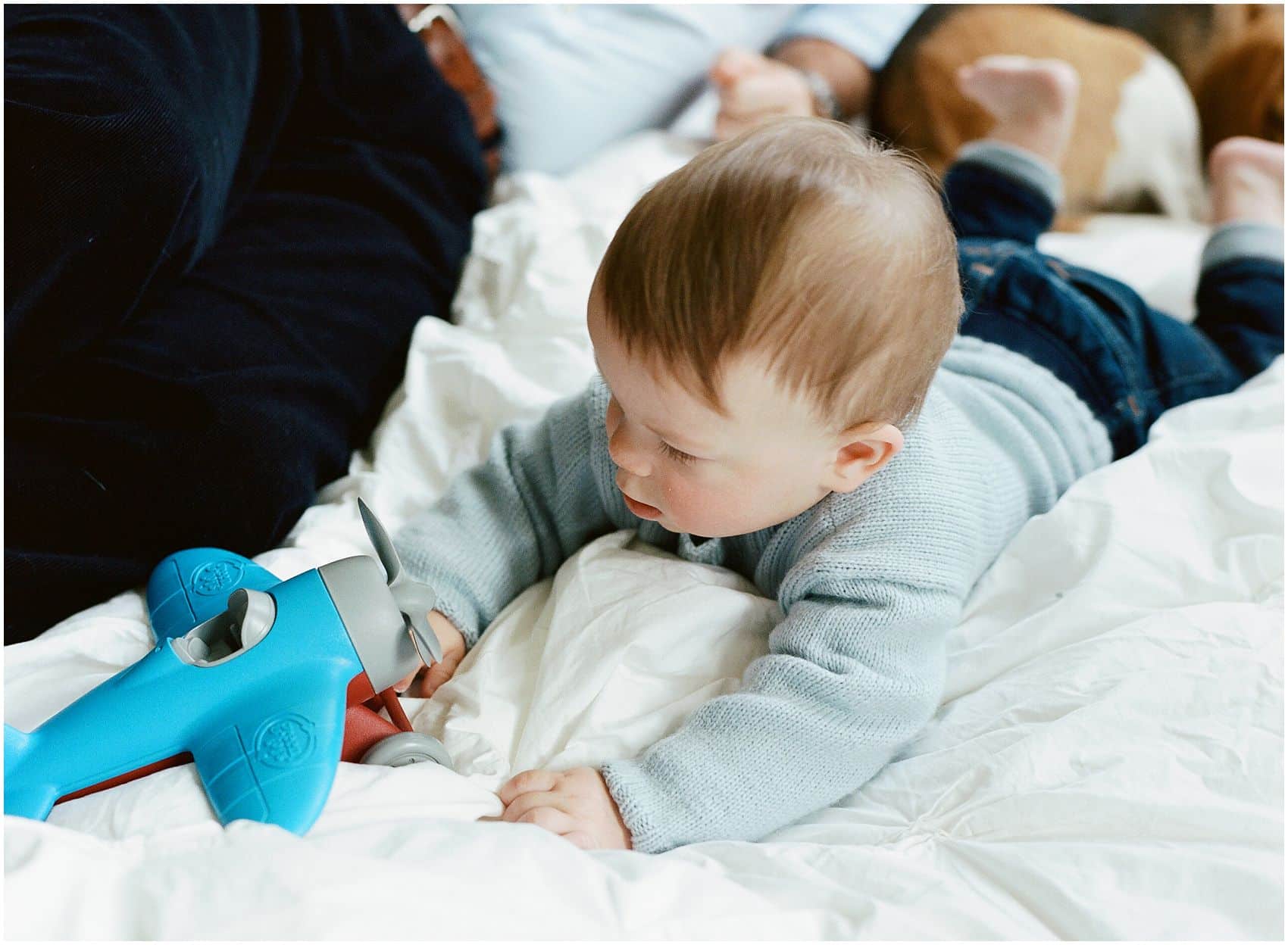 baby with the airplane toy