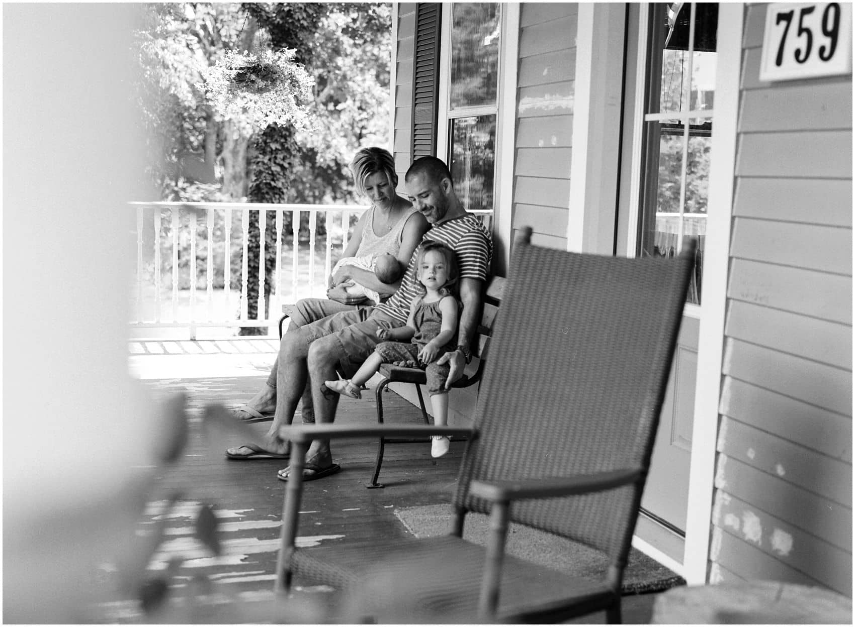 photographer captures the new family on their porch