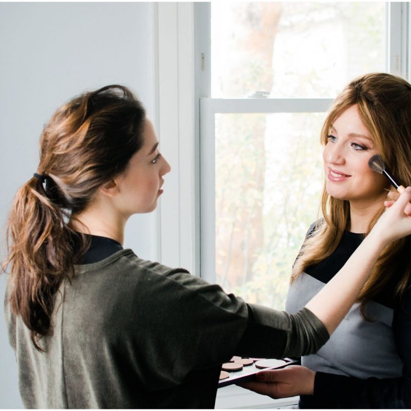 applying hair and makeup