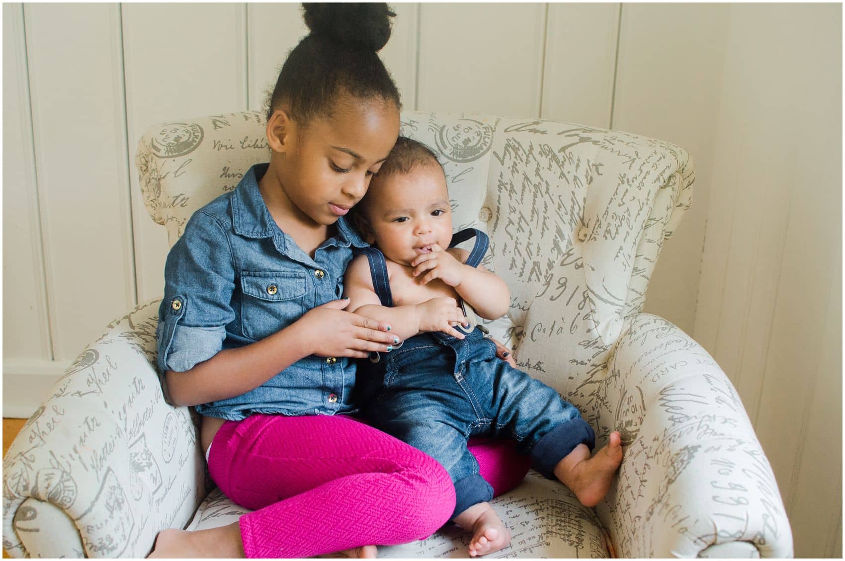 little sister hugging her baby brother in Upper Montclair NJ