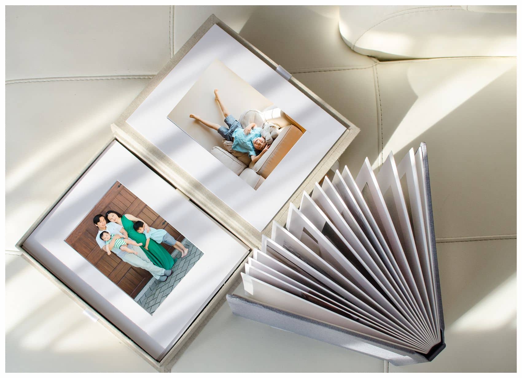 Fine art prints of a young family with two kids wearing neutral and green, captured in a family photography NYC session